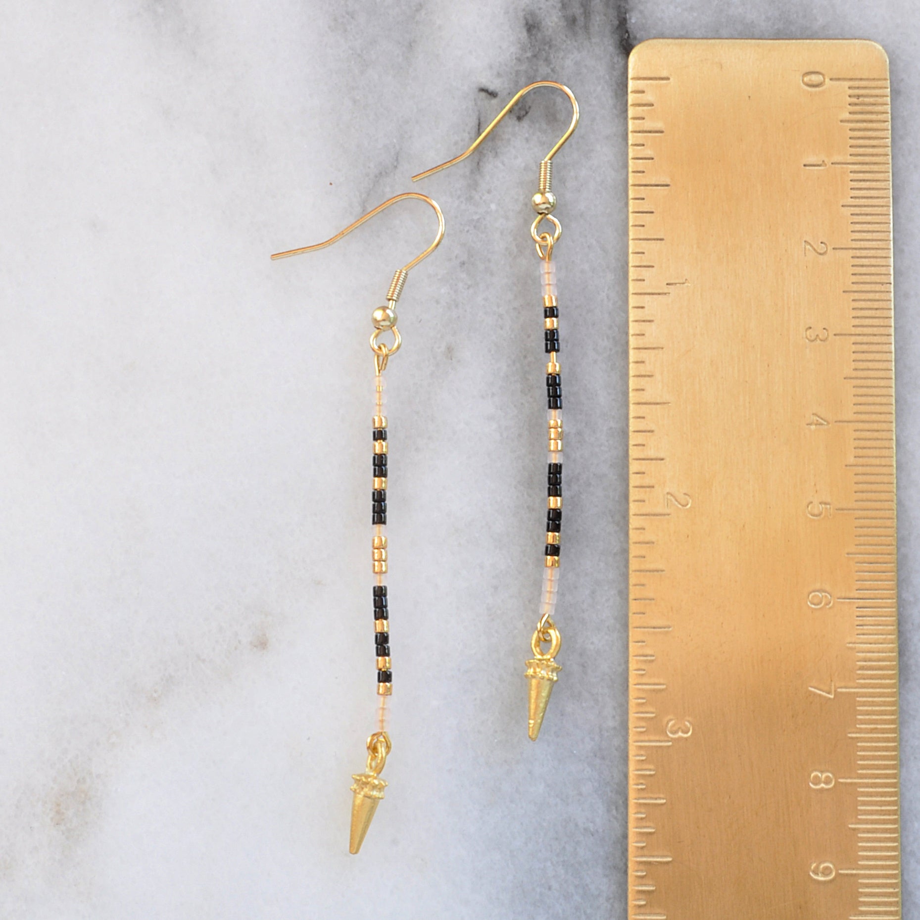 Long beaded stick earrings in Noir pattern by Libby & Smee