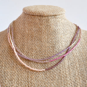 Libby & Smee beaded wrap bracelet strand in purple, on mannequin