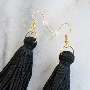 Libby & Smee black tassel earrings, close up with plastic earring back