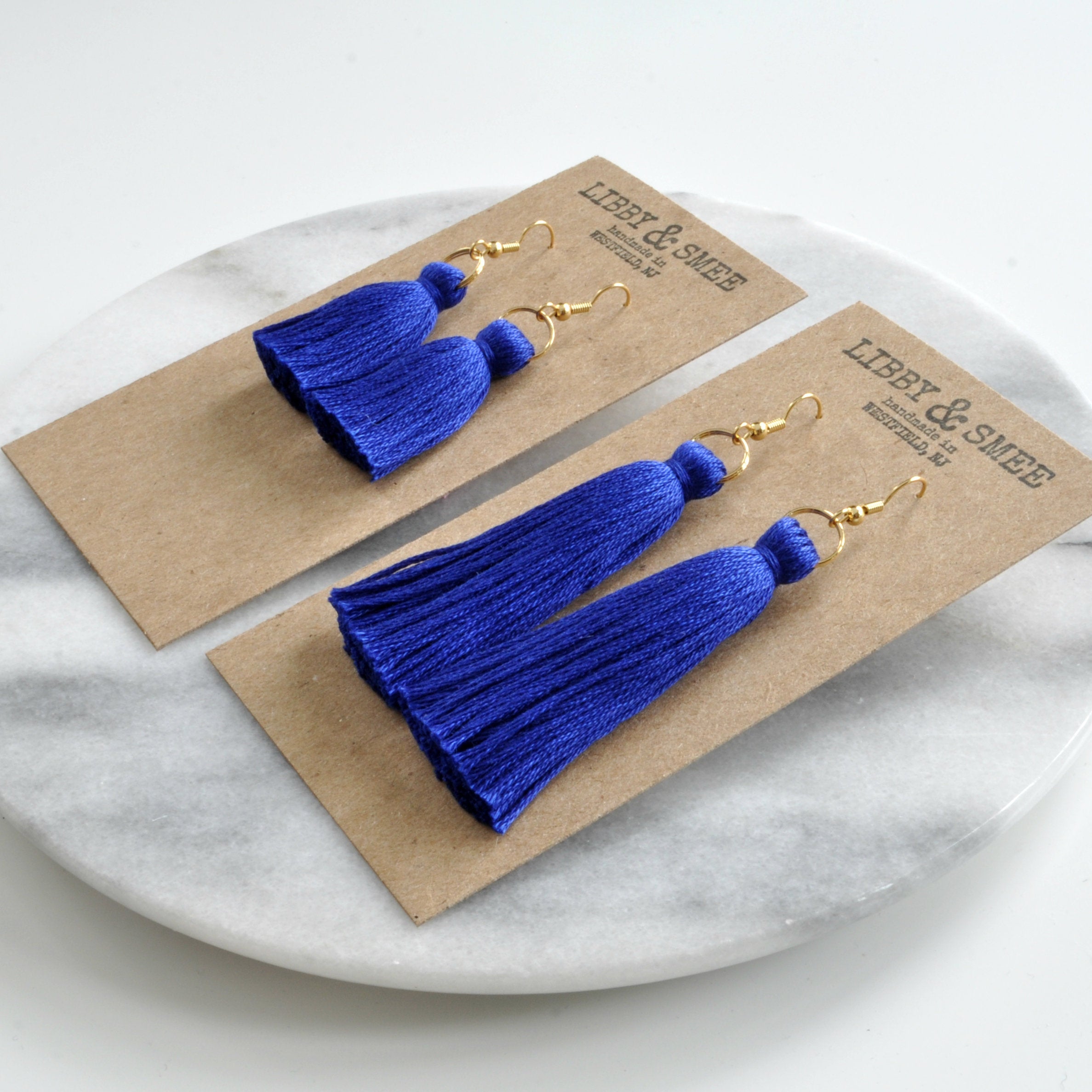 Libby & Smee Cobalt Blue Tassel Earrings in Mini and Long on kraft earring cards - side angle