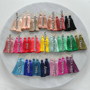Libby & Smee Mini Boho Tassel Earrings in 23 colors labeled, still life