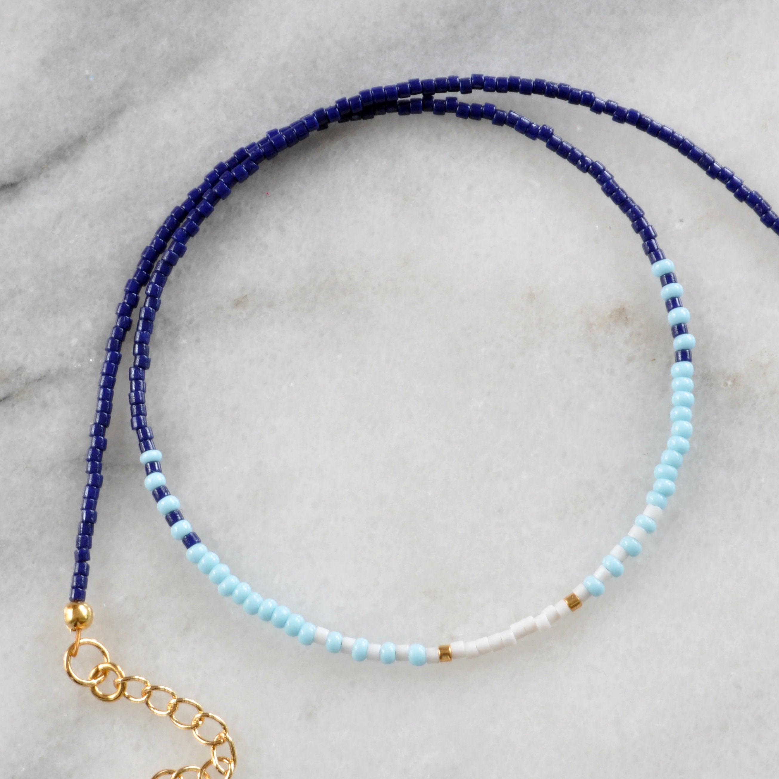 Libby & Smee Tailgate Choker Necklace in light blue navy and white, still life close up