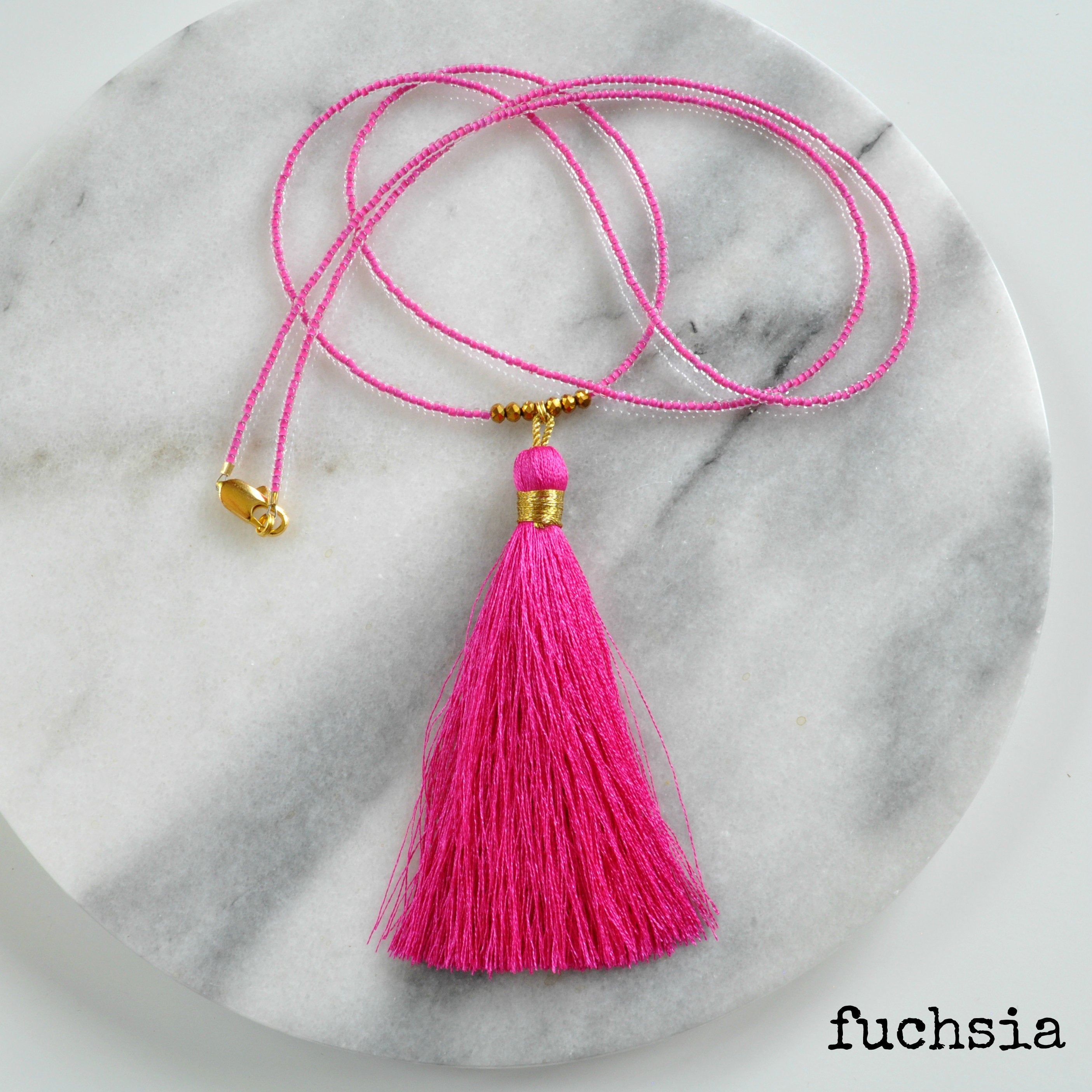 Libby & Smee Beaded Tassel Necklace in  Fuchsia, still life labeled