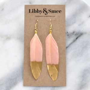 Libby & Smee blush and gold 4 inch feather earrings